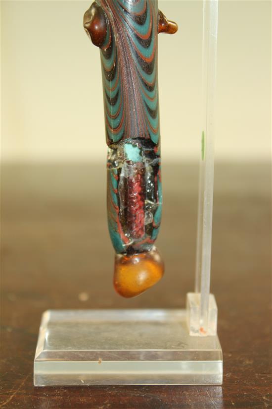 Two Roman glass unguentarium, c. 2nd century A.D., 10.5 and 12cm